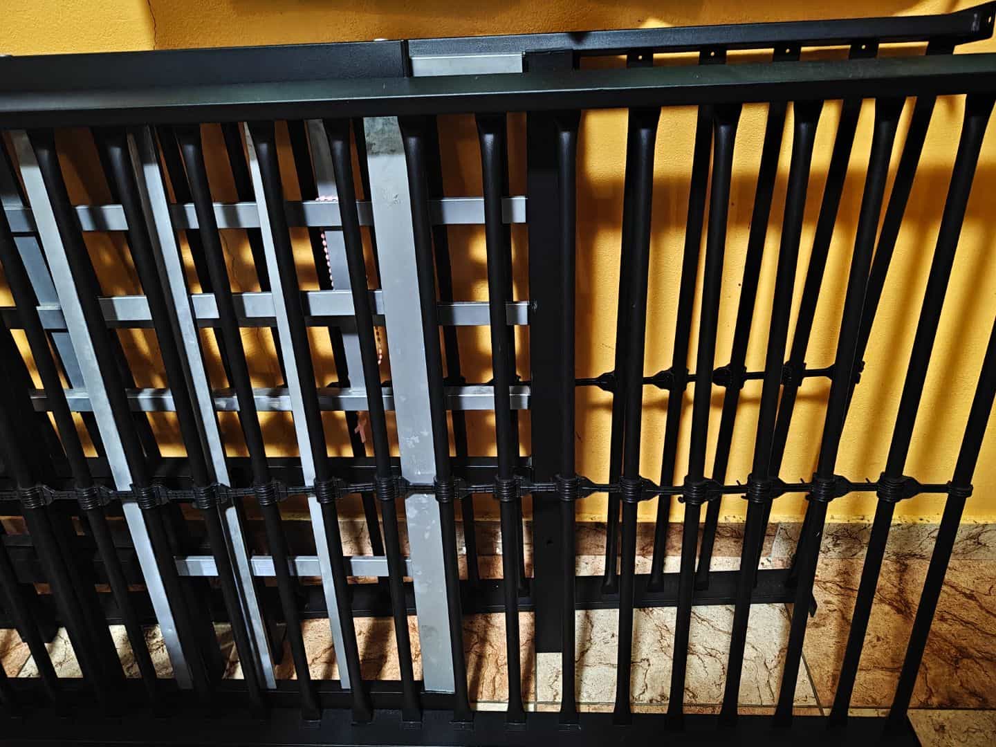 Black Metal Single Bed with used mattress